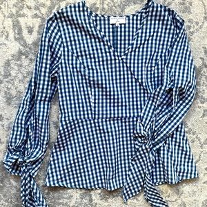 Long sleeved gingham peplum top